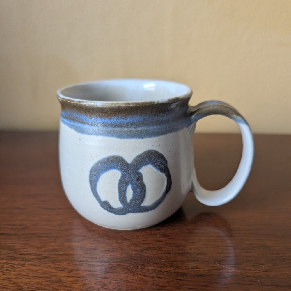Handcrafted Ceramic Mug with Blue Infinity Symbol Signed